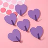 Heart-shaped hooks in purple