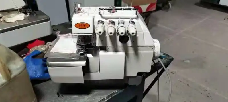 QK-747  Ordinary Model Wholesale Price 4-thread Flatbed Industrial Overlock Sewing Machine