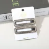 Conjunto de dos piezas cuadrado color champán con diamante cuadrado.