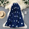 Navy blue with large polka dots