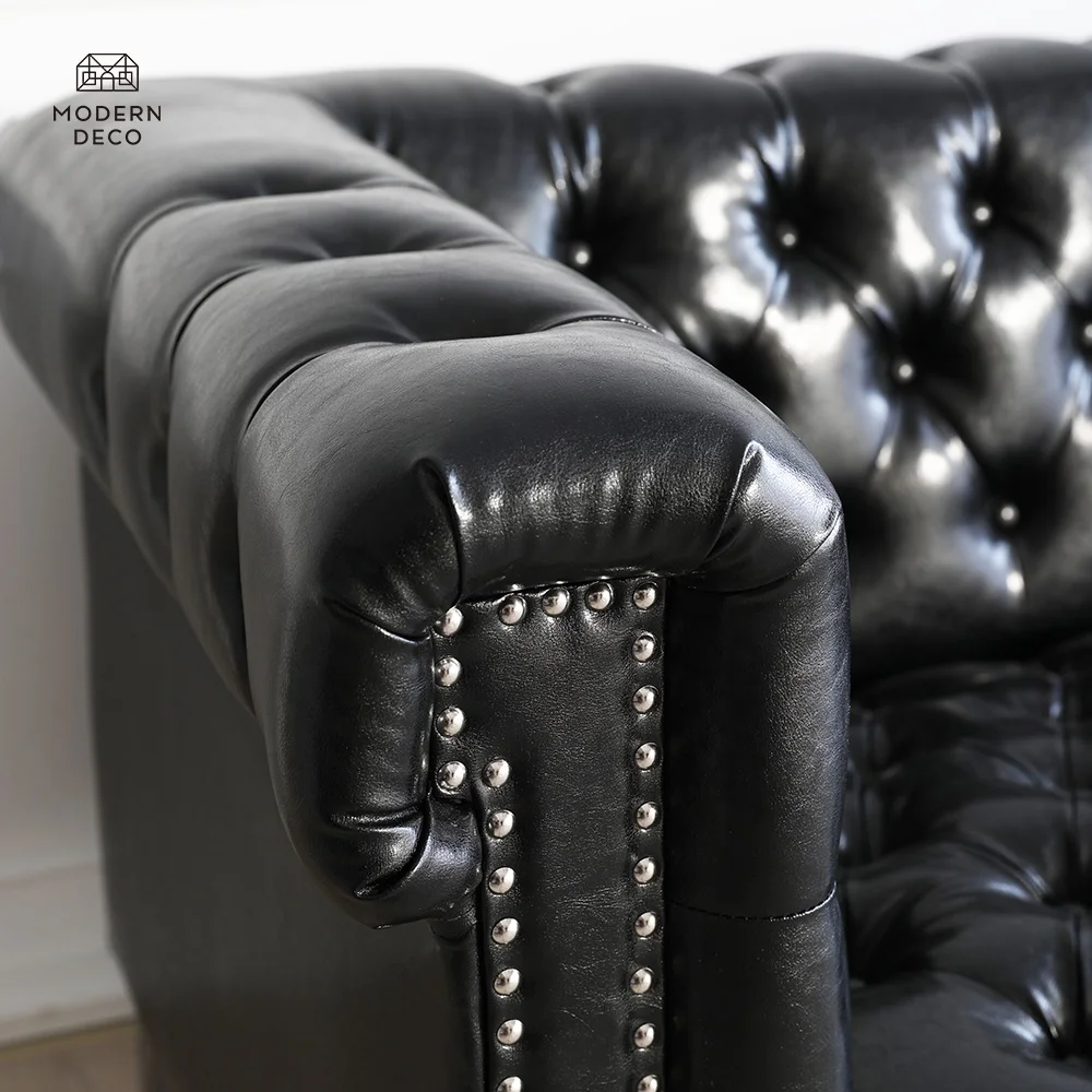 Fekete mesterséges bőrös Chesterfield kanapé 3 ülőhelyes ezüst fémes lábakkal, gömbölyű karfákkel, fémhártyás díszeléses nappali, lounge, iroda