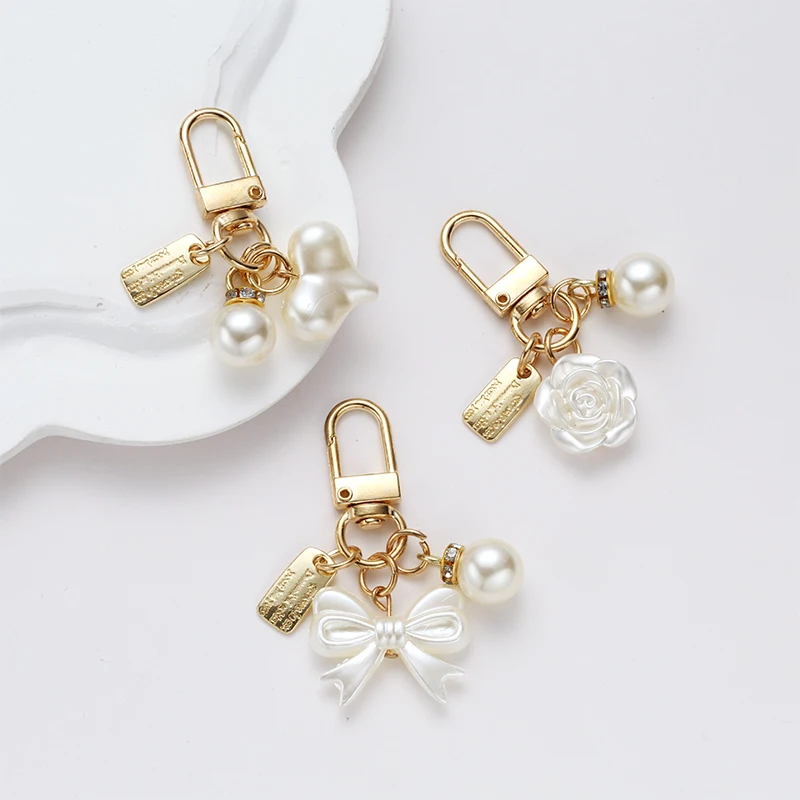 Fresh Creative New Pearl Alloy Keychain Pendant Bow Lock Key Accessories with Heart and Bag Made of Durable Acrylic Plastic