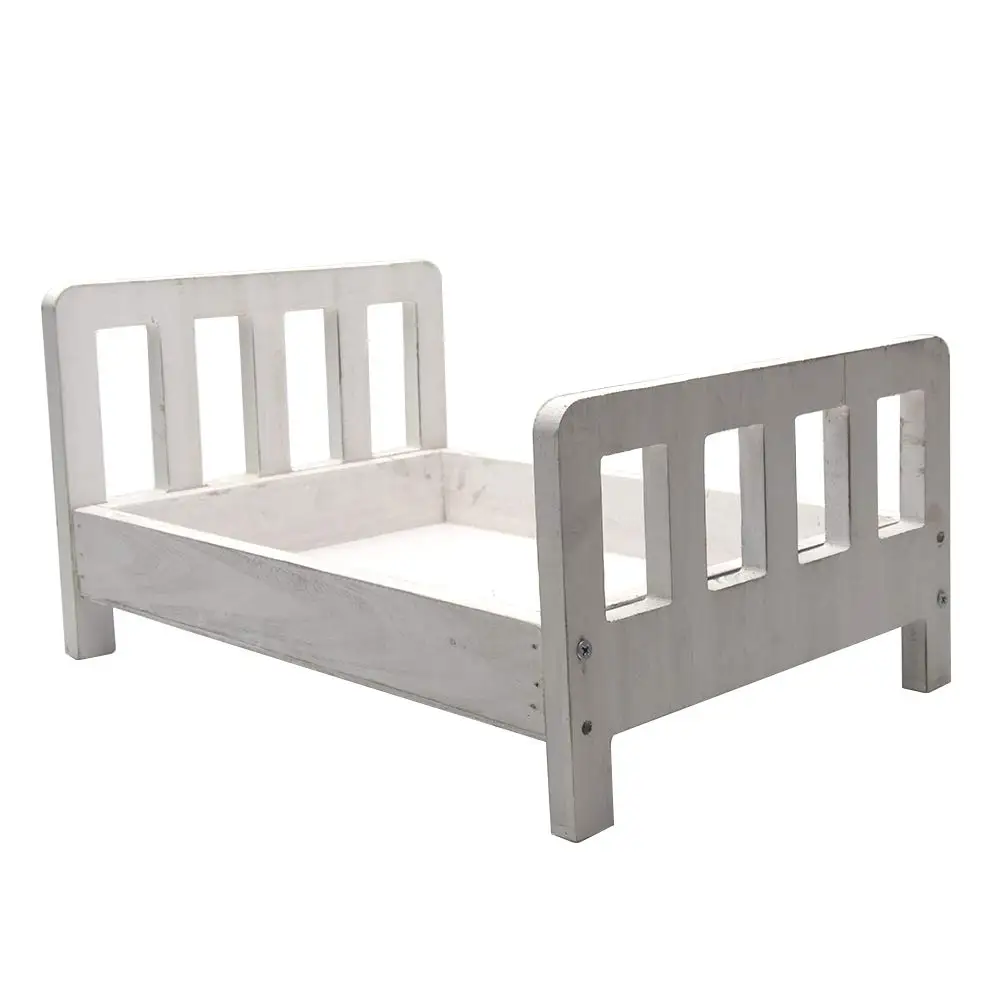 small wooden cot