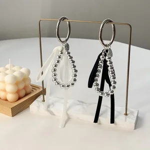 Unique Bow Car Keychain - Instagram-Worthy French Elegance with Silver UV Beads Ribbon, Chic Bag Charm