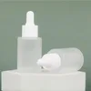 frosted bottle with white dropper