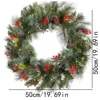 Guirlande de pommes de pin et baies rouges - 50 cm