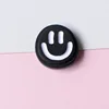 Faccina sorridente nera