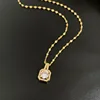 Colgante de cobre con collar de acero titanio H204