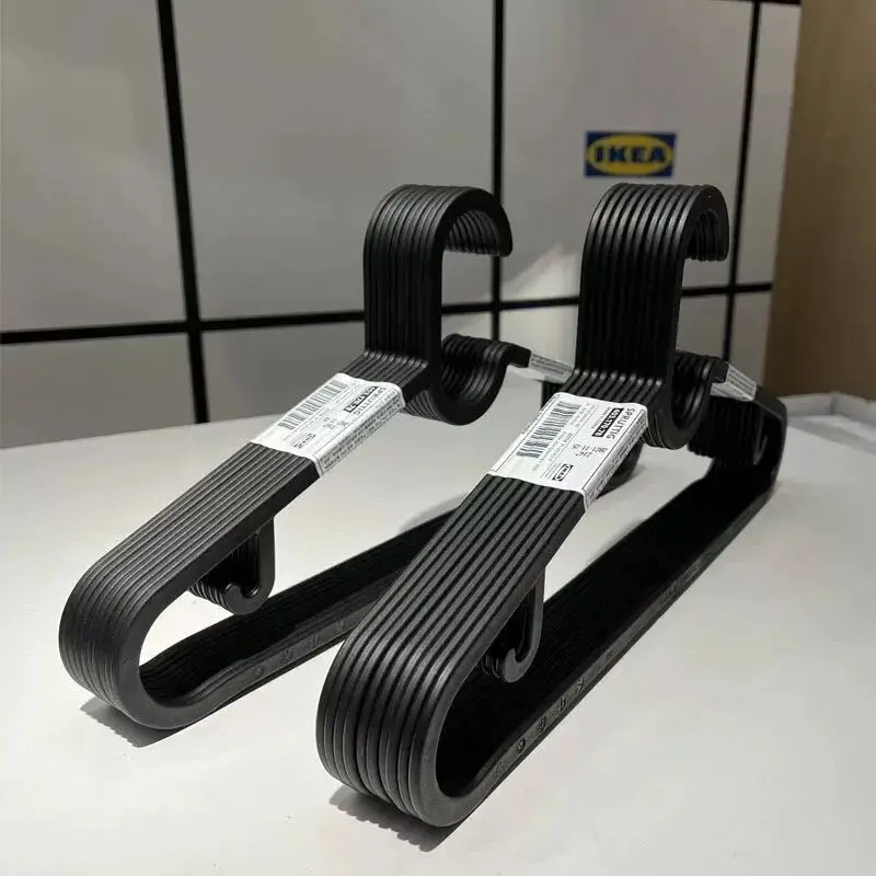 Modern Japanese Korean Coat Hanger with Plastic Coat Simple Traceless Style for Men and Women Bag-Friendly Coat Hanger