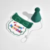Green bib hat