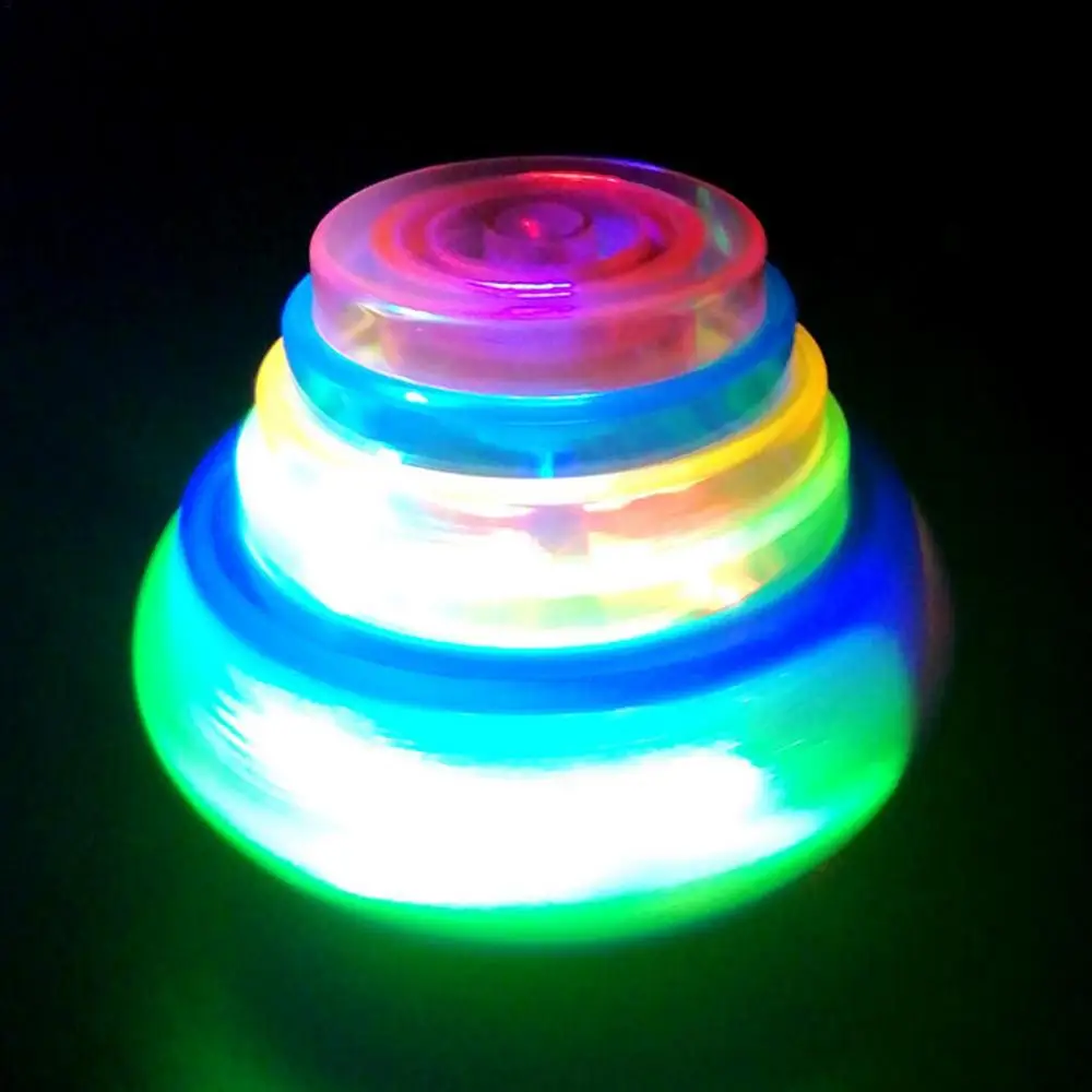 Popular LED Light up Flashing UFO Bouncing Spinning Tops With Gyroscope Novelty Bulk Children Toys Party Favors Funny Toys