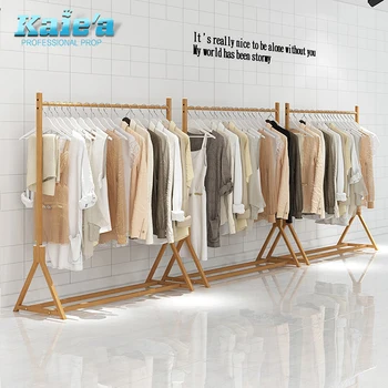Buy Modern Shop Wooden Hanger Stand Lady Clothes And Bags Display Rack Bag  Display Shelf from Foshan Kaierda Display Furniture Co., Ltd., China