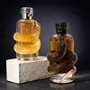 Bouteille de parfum vide et transparente