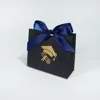 Black bag with blue ribbon
