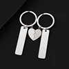 5012 longues bandes + demi-cœur + porte-clés - paire argentée