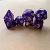 Pearl pattern purple dot gold lettering