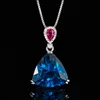 Pendentif cristal pointu bleu avec chaîne vénitien.