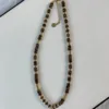 3    Tiger's Eye Frisbee Pendant Necklace