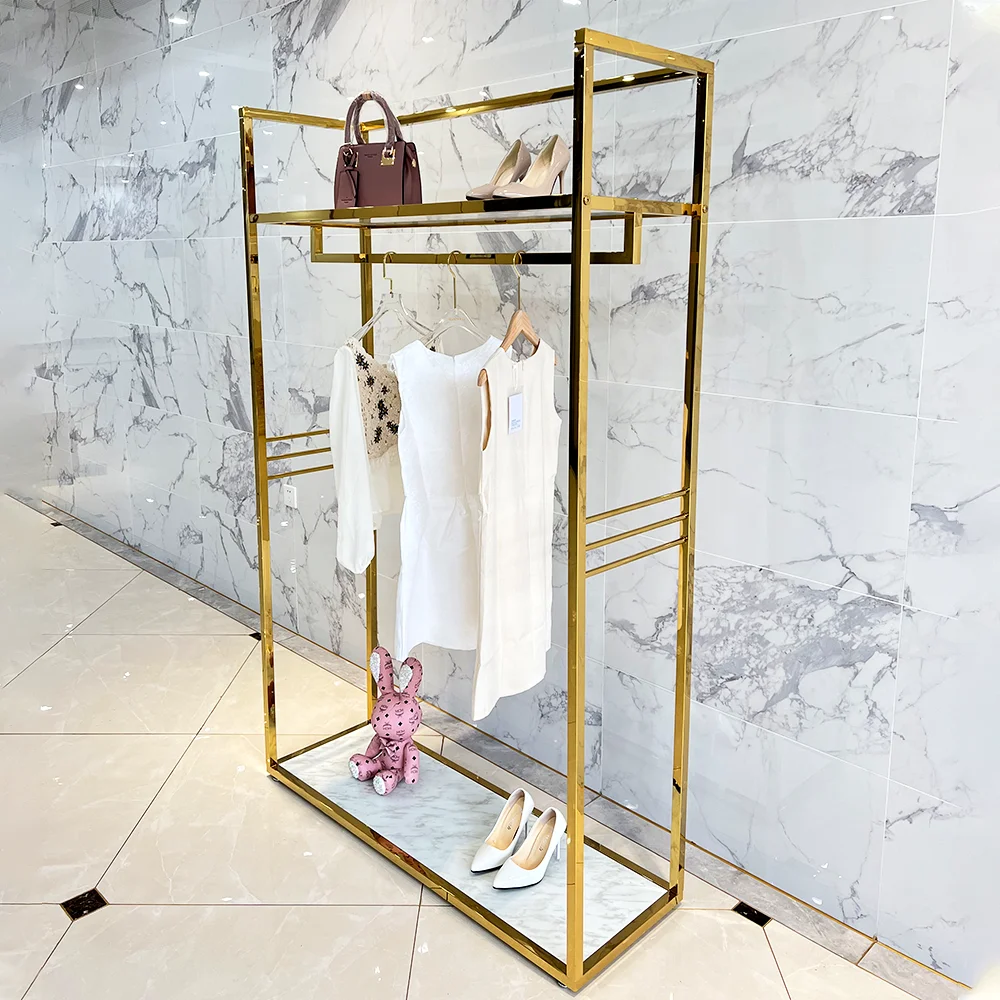 Espositore per abbigliamento da donna Boutique Store elegante da pavimento  in oro vestiti appesi con supporto per vendita al dettaglio di scaffali per 