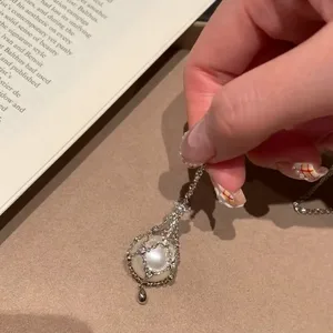 Lady Style Vintage Fashion Niche S925 Sterling Silver Sweater Chain with Light Luxury Net Pocket and Platinum Cage for Ladies