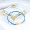 Chiusura oro + vera pelle di pecora blu
