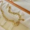 Bracciale DD con perle dorate