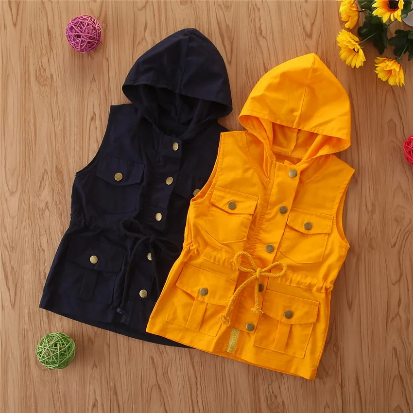 yellow sleeveless jacket