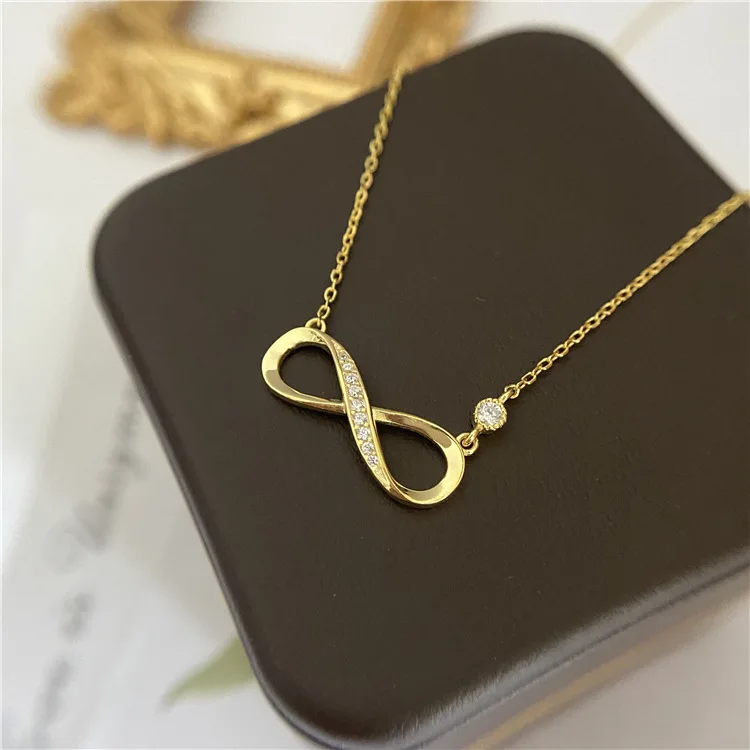 14k gold infinity pendant