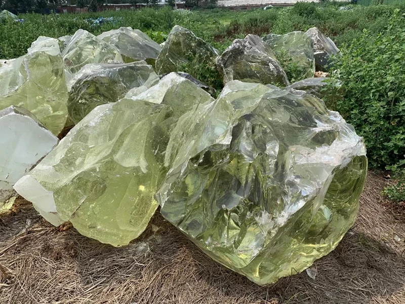 Large colored green slag glass rocks for garden landscaping