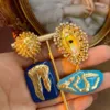 Orecchini per occhi, denti e orecchie