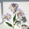 Oil painting of irises in light purple