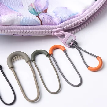Wholesale PVC/TPU fancy rubber soft zipper puller for garment Diy silicone rope zipper slider