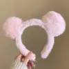 Pink plush ears
