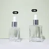 Clear bottle  with silver dropper head