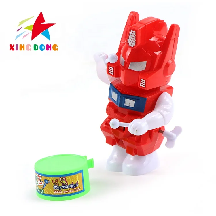 Wholesale custom wind up toys cute mini cartoon boy beat a drum winding machine drum