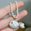 Gold Zhongwei  (natural pearl+imitation pearl)