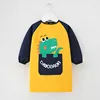 Long sleeve apron yellow dinosaur