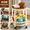 Off-white two-tier rotating storage rack