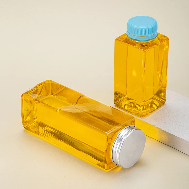Custom Logo Cylindrical Transparent Design PP 250ml Plastic Bottles 500ml Aluminum Lid Juice Bottles factory