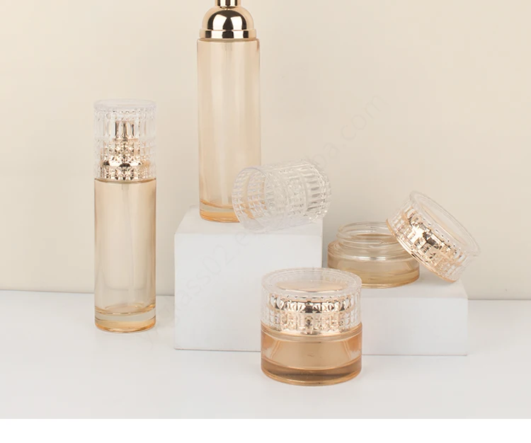 Luxury cosmetic containers and packaging lotion pump glass bottles for cosmetics manufacture