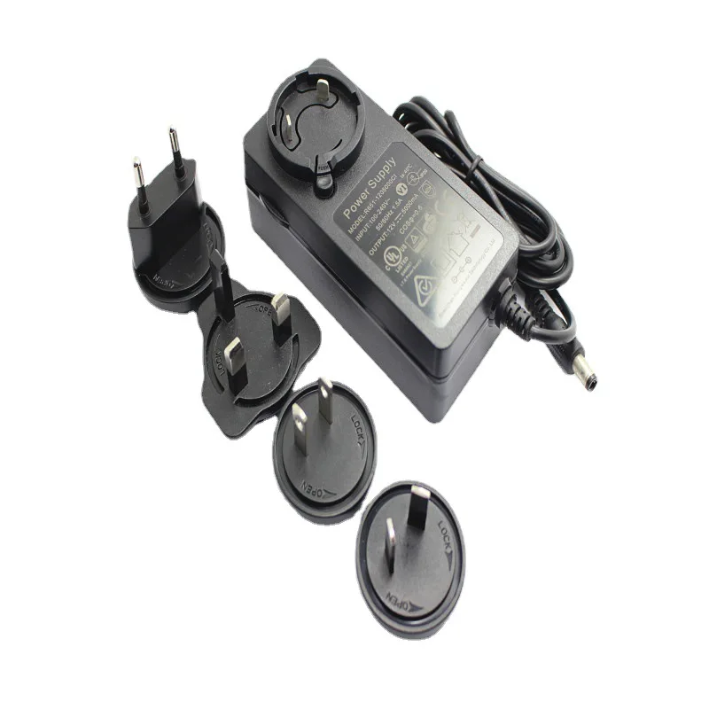 Universal 220V Input AC to DC Power Supply Adapter with 12V 700MA Output