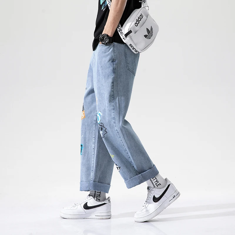 Tendencia de moda Denim Pintado Logo Diseño Stock Jeans Original