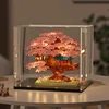 Grande boîte de présentation en forme de cerisier en fleurs rose.