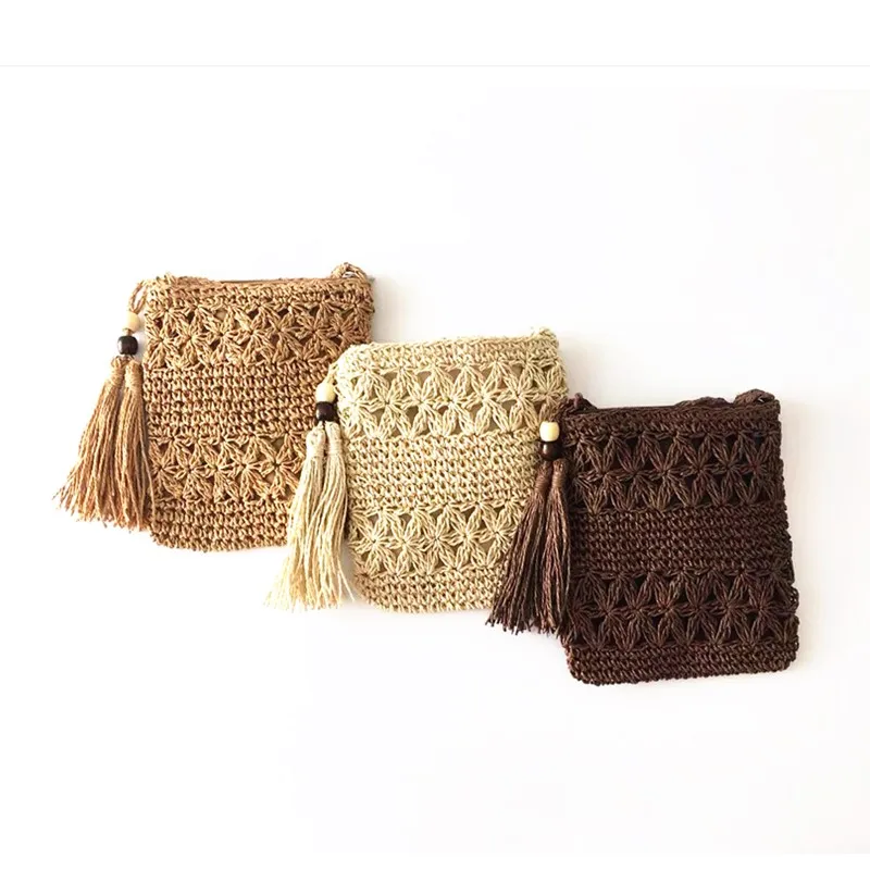 Wholesale Ins Paper Hand made Hollow out Crochet Crossbody Straw bags with  Tassel From m.