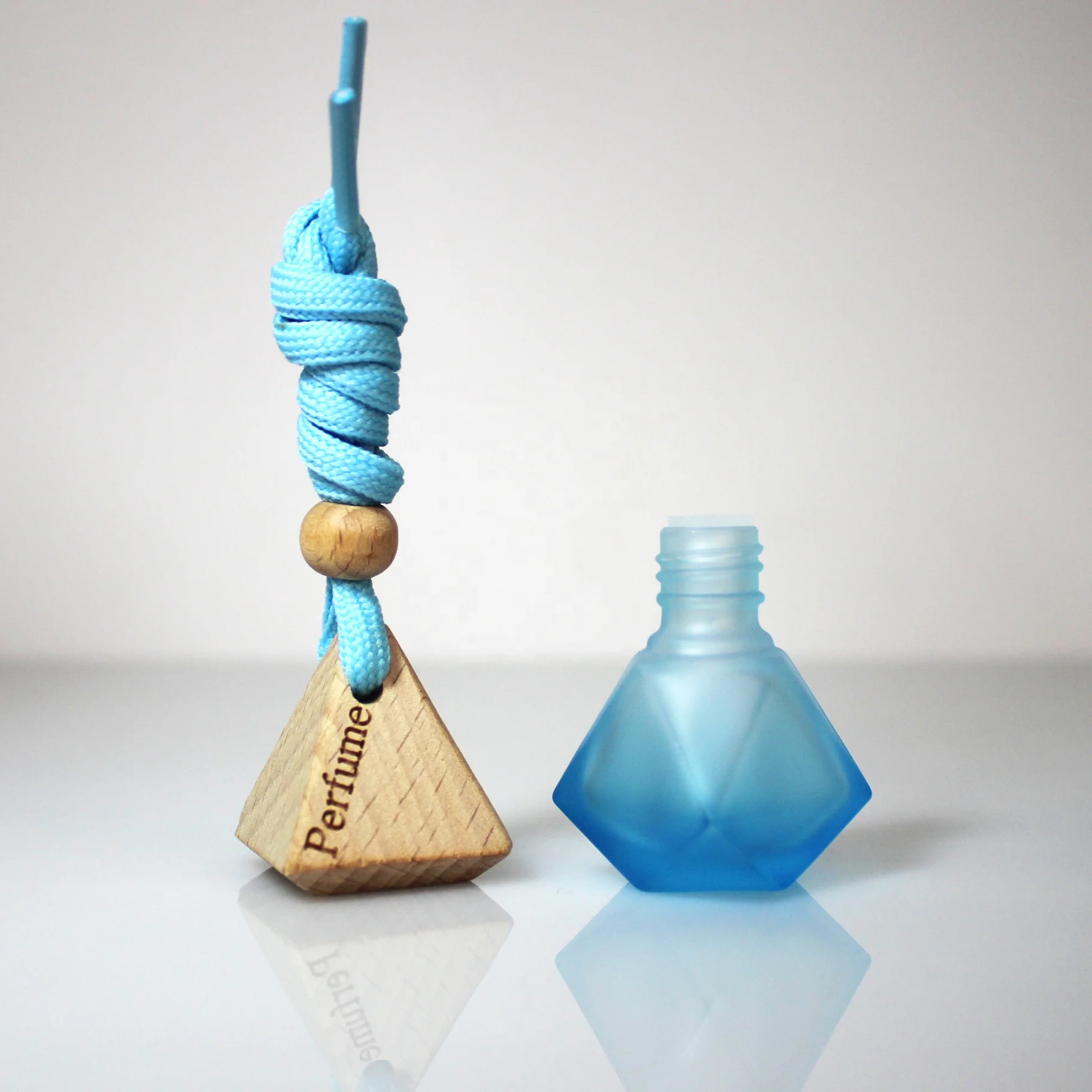 Wholesale 8ML Multi-Color Matte Car Aroma Bottle With Wooden Cover and Lanyard Wonderful Pyramid Shape Car Perfume Diffuser
