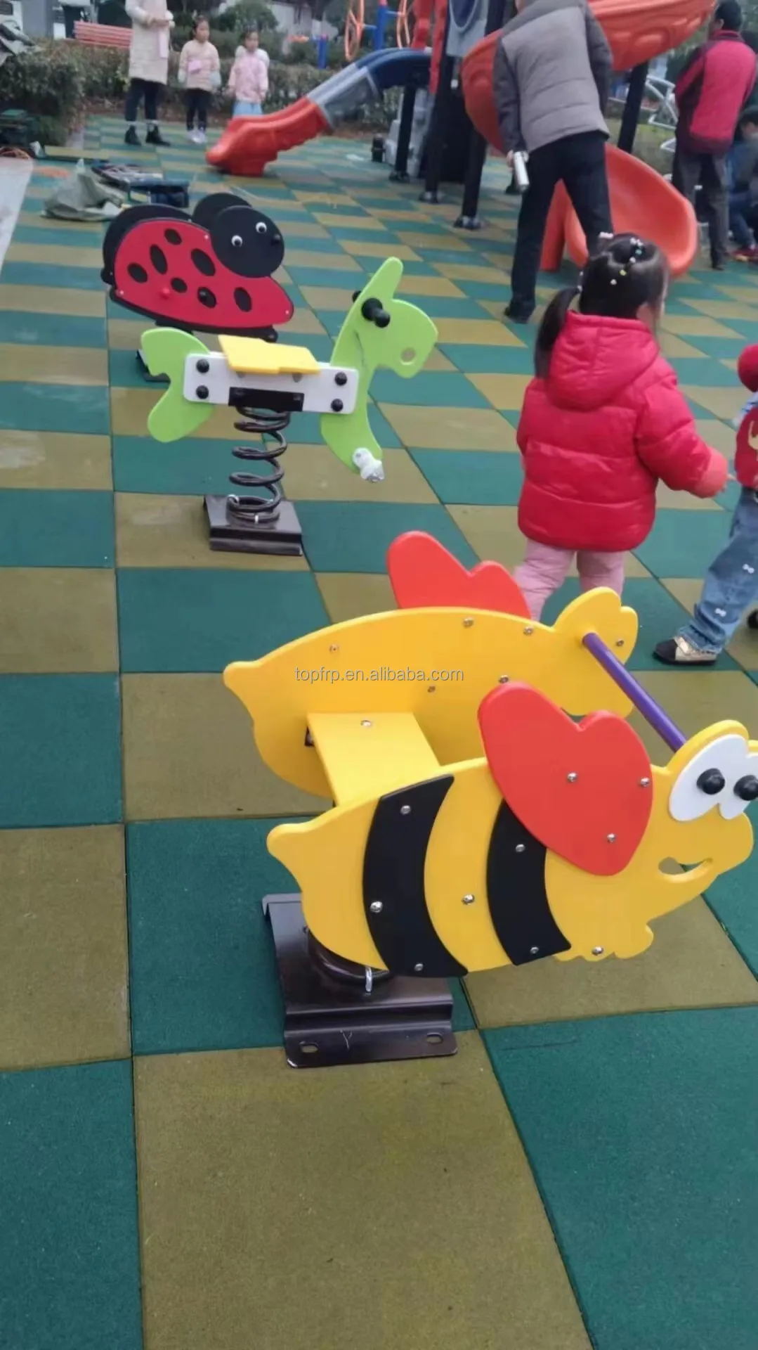 Rubber interlocking flooring tiles for playgrounds backyards and play