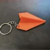 Llavero de avión de papel - naranja