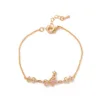 3 butterfly bracelets gold
