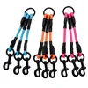 Orange dog leads with 3 dogs triple