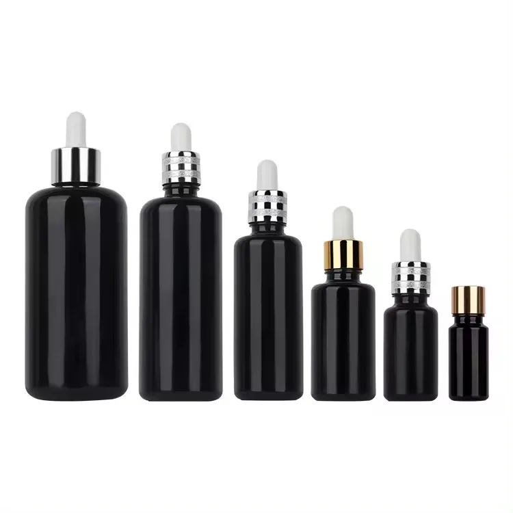 Custom 10ml/15ml/30ml/50ml/100ml/200ml black Essential Oil Packaging Bottles Glass Bottle Dropper glass Bottle wholesale